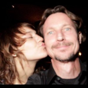 Allan Sturm gets a random kiss from an admirer in Tucson Arizona