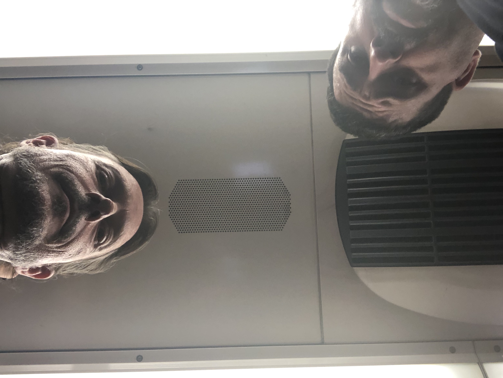 Allan Sturm and Rico Rodriguez Selfie in an Airplane
